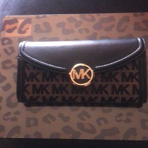 In good condition, gently used BLk Mk wallet 2 front slip pocket and back pocket